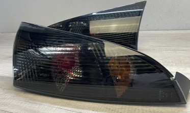 Фонари задние Ford Focus 1 hatchback тонированные фото