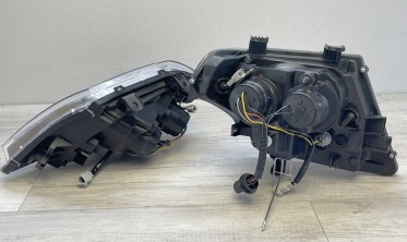 Тюнинговые передние фары Nissan Frontier 09-14 с линзами и LED габаритами фото