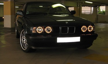 Фары передние тюнинговые BMW E32, E34 с ангельскими глазками фото