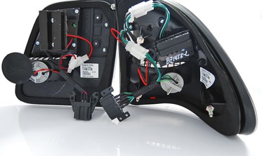 Тоновані ліхтарі задні MERCEDES Е W210 універсал фото