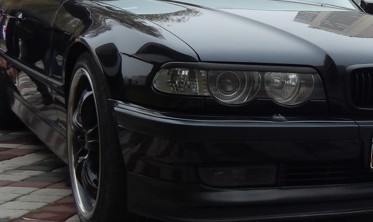 Повороты передние BMW E38 рестайлинг тонированные фото