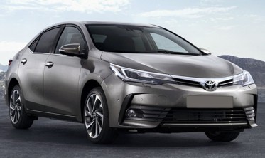 Накладка на бампер із загином та ребрами Toyota Corolla XI E160 FL Sedan фото