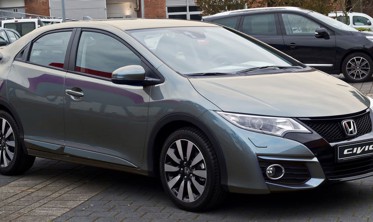 Накладка на бампер с загибом и ребрами Honda Civic 9 Hatchback фото